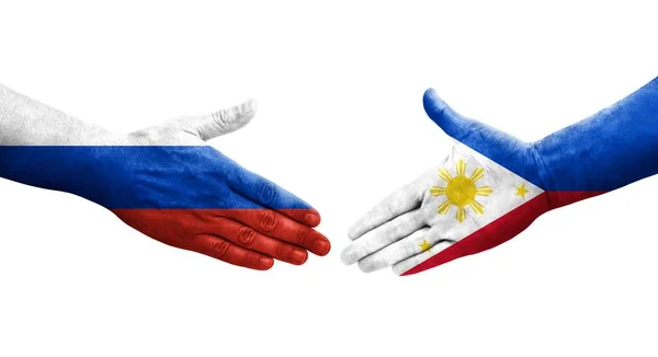 Handslag Mellan Filippinerna Och Ryssland Flaggor Målade Händer Isolerad Transparent — Stockfoto