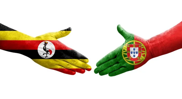 Handdruk Tussen Portugal Oeganda Vlaggen Handen Geschilderd Geïsoleerd Transparant Beeld — Stockfoto