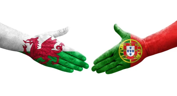 Apretón Manos Entre Portugal Gales Banderas Pintadas Las Manos Imagen — Foto de Stock