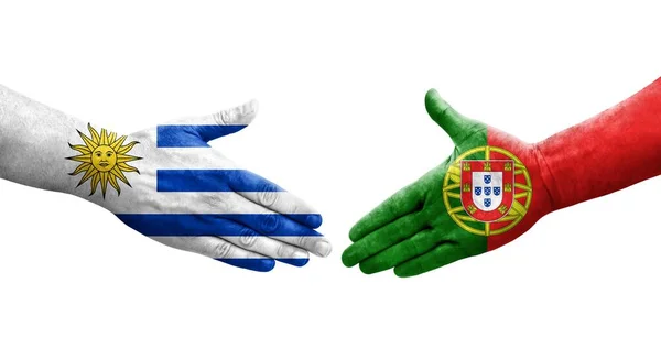 Uścisk Dłoni Między Portugalią Urugwajem Flagi Malowane Rękach Odizolowany Przezroczysty — Zdjęcie stockowe