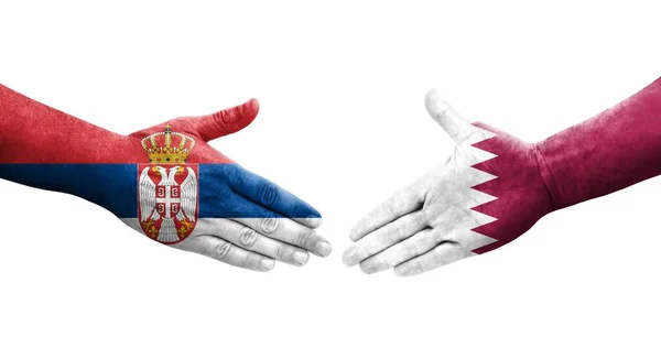Apretón Manos Entre Qatar Serbia Banderas Pintadas Las Manos Imagen — Foto de Stock