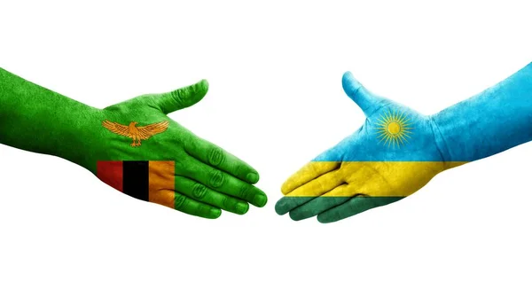 Handslag Mellan Rwanda Och Zambia Flaggor Målade Händer Isolerad Transparent — Stockfoto