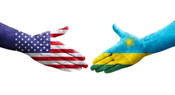 Händedruck Zwischen Ruandischen Und Amerikanischen Flaggen Auf Hände Gemalt Isoliertes — Stockfoto