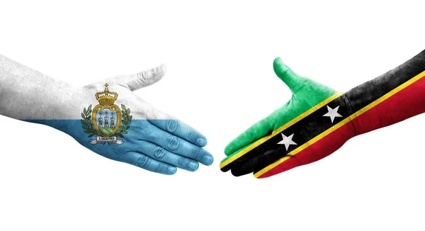 Handdruk Tussen Saint Kitts Nevis San Marino Vlaggen Geschilderd Handen — Stockfoto