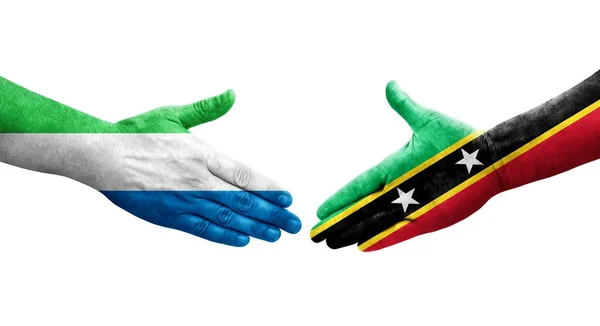 Handdruk Tussen Saint Kitts Nevis Sierra Leone Vlaggen Geschilderd Handen — Stockfoto