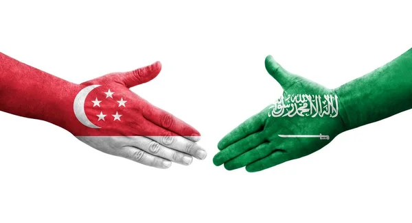 Handdruk Tussen Saoedi Arabië Singapore Vlaggen Geschilderd Handen Geïsoleerd Transparant — Stockfoto