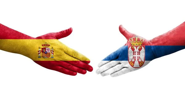 세르비아 스페인 깃발을 손으로 흔들며 형상을 그렸다 — 스톡 사진