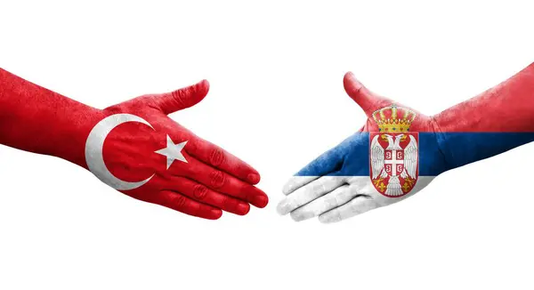 Mano Apretada Entre Las Banderas Serbia Turquía Pintadas Las Manos — Foto de Stock
