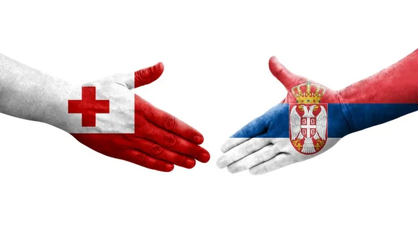 Handslag Mellan Serbien Och Tonga Flaggor Målade Händer Isolerad Transparent — Stockfoto