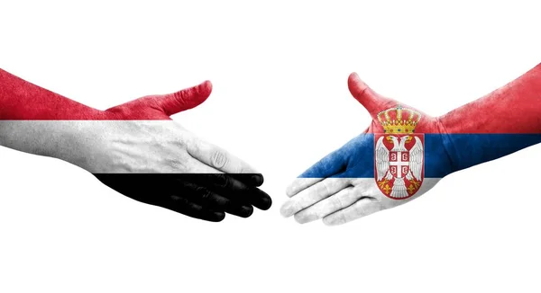 Handdruk Tussen Servië Jemen Vlaggen Geschilderd Handen Geïsoleerd Transparant Beeld — Stockfoto