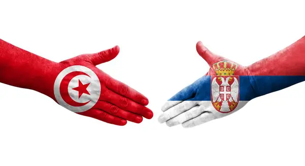 Mano Apretada Entre Serbia Túnez Banderas Pintadas Las Manos Imagen — Foto de Stock