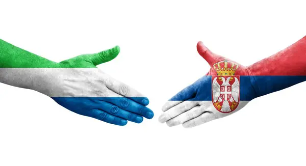 Handshake Entre Sérvia Serra Leoa Bandeiras Pintadas Mãos Imagem Transparente — Fotografia de Stock