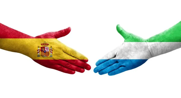 시에라리온 스페인 깃발을 손으로 만져서 이미지를 시에라리온 스페인 사이의 — 스톡 사진