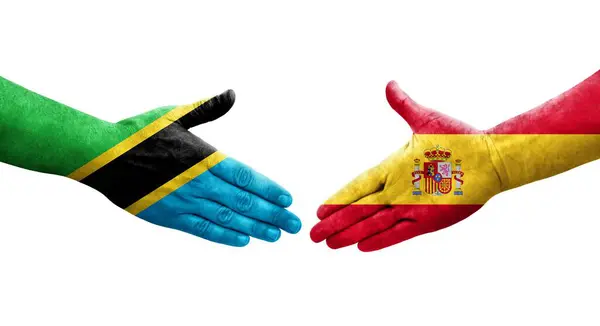 Рукостискання Між Іспанією Танзанійськими Прапорами Намальоване Руках Ізольоване Прозоре Зображення — стокове фото