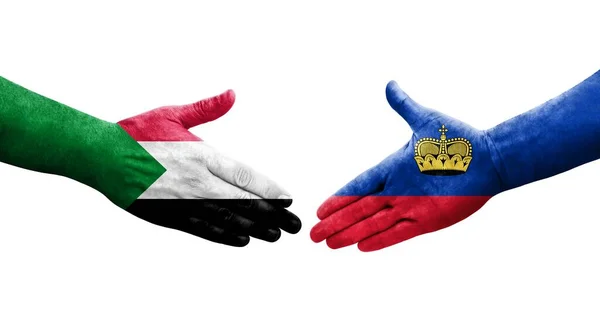 Рукопожатие Между Флагом Судана Лихтенштейна Нарисованное Руках Изолированное Прозрачное Изображение — стоковое фото