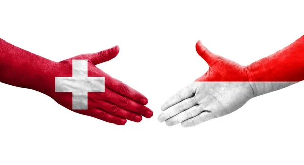 Uścisk Dłoni Między Szwajcarią Indonezją Flagi Malowane Rękach Odizolowany Przezroczysty — Zdjęcie stockowe