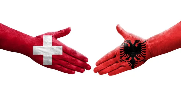 Handdruk Tussen Zwitserland Albanië Vlaggen Handen Geschilderd Geïsoleerd Transparant Beeld — Stockfoto
