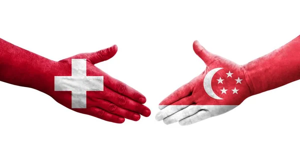 Uścisk Dłoni Między Szwajcarią Singapurem Flagi Malowane Rękach Odizolowany Przezroczysty — Zdjęcie stockowe
