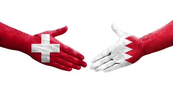 Uścisk Dłoni Między Szwajcarią Flagami Bahrajnu Namalowanymi Dłoniach Odizolowany Przezroczysty — Zdjęcie stockowe