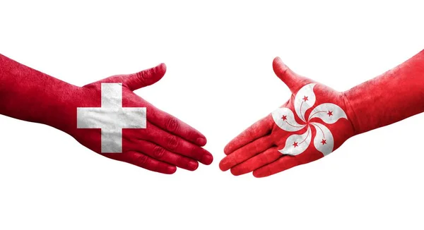 Uścisk Dłoni Między Szwajcarią Hong Kongiem Flagi Malowane Rękach Odizolowany — Zdjęcie stockowe