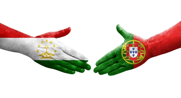 Рукопожатие Между Таджикистаном Португалией Раскрашенные Руках Флаги Изолированное Прозрачное Изображение — стоковое фото