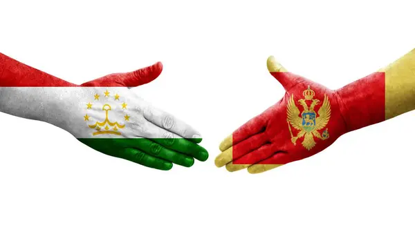 Händedruck Zwischen Tadschikistan Und Montenegro Fahnen Auf Hände Gemalt Isoliertes — Stockfoto