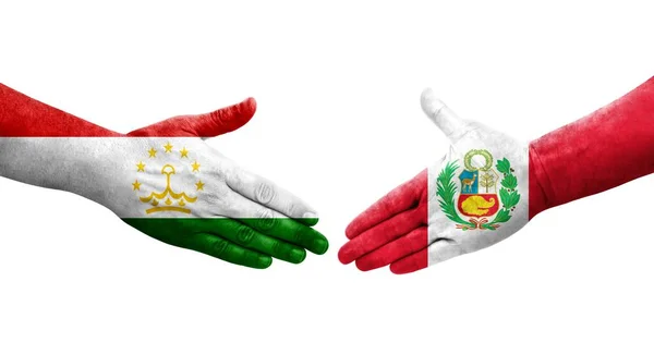 Рукопожатие Между Таджикистаном Перу Раскрашенные Руках Флаги Изолированное Прозрачное Изображение — стоковое фото