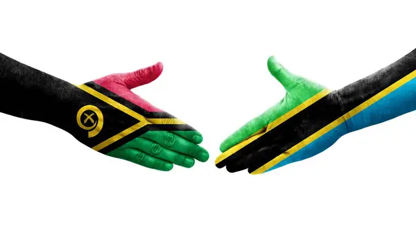 stock image Handshake between Tanzania and Vanuatu flags painted on hands, isolated transparent image.