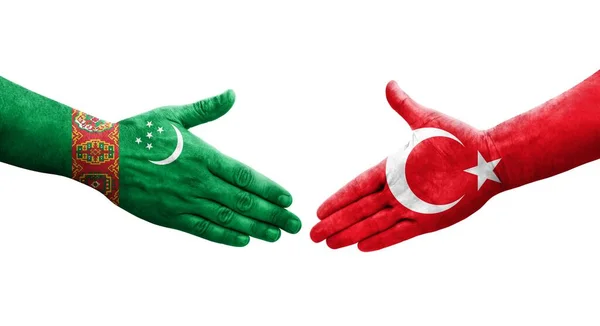 土耳其和土库曼斯坦之间的握手手绘国旗 孤立透明的形象 — 图库照片