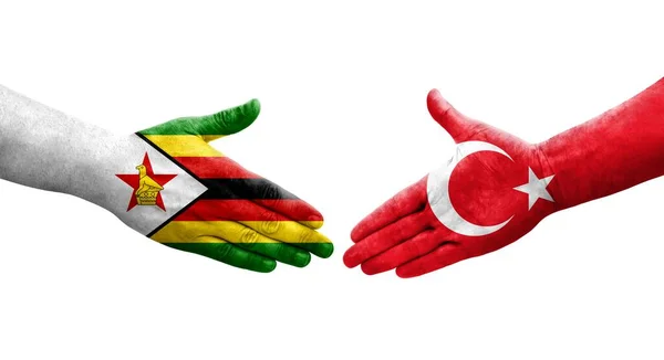 Χειραψία Μεταξύ Τουρκίας Και Ζιμπάμπουε Σημαιών Ζωγραφισμένη Στα Χέρια Απομονωμένη — Φωτογραφία Αρχείου