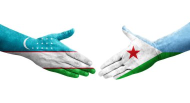 Özbekistan ile Cibuti bayrakları arasındaki el sıkışma, izole şeffaf resim.