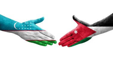 Ellerine Özbekistan ve Ürdün bayrakları arasında el sıkışma, izole şeffaf görüntü.