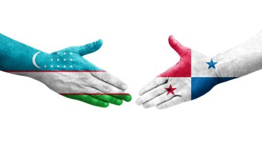 Ellerine Özbekistan ve Panama bayrakları arasında el sıkışma, izole şeffaf görüntü.