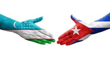 Ellerinde Özbekistan ve Küba bayrakları arasında el sıkışma, izole şeffaf görüntü.