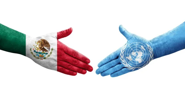 Uścisk Dłoni Między Onz Meksykiem Flagi Malowane Rękach Odizolowany Przezroczysty — Zdjęcie stockowe