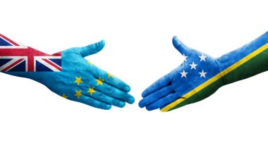 Solomon Adaları ve Tuvalu bayrakları arasındaki el sıkışma, izole edilmiş şeffaf görüntü.