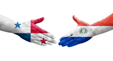 Ellerinde Paraguay ve Panama bayrakları arasında el sıkışma, izole şeffaf görüntü.