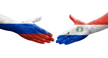 Paraguay ve Rusya arasındaki el sıkışma ellerinde bayraklar, izole şeffaf görüntü.