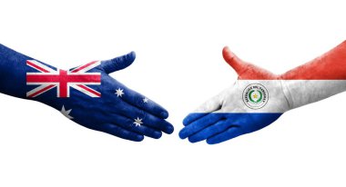 Ellerinde Paraguay ve Avustralya bayrakları arasında el sıkışma, izole şeffaf görüntü.