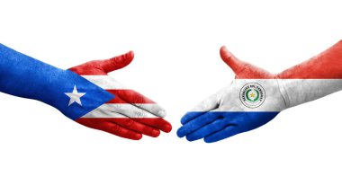 Paraguay ve Porto Riko bayrakları arasındaki el sıkışma ellerinde izole şeffaf görüntü.