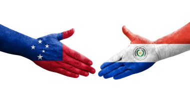 Ellerinde Paraguay ve Samoa bayrakları arasında el sıkışma, izole şeffaf görüntü.