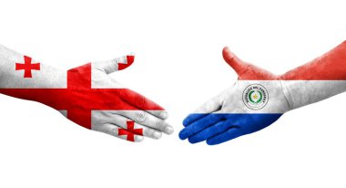 Ellerinde Paraguay ve Gürcistan bayrakları arasında el sıkışma, izole şeffaf görüntü.