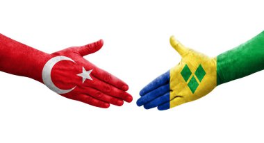 Saint Vincent Grenadines ile Türkiye bayrakları arasındaki el sıkışma, izole şeffaf görüntü.