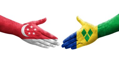 Saint Vincent Grenadines ve Singapur bayrakları arasındaki el sıkışma, izole şeffaf görüntü.