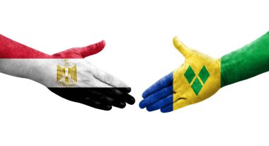 Saint Vincent Grenadines ve Mısır bayrakları arasındaki el sıkışma, izole şeffaf görüntü.