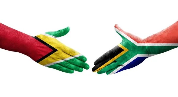 Handdruk Tussen Zuid Afrika Guyana Vlaggen Geschilderd Handen Geïsoleerd Transparant — Stockfoto