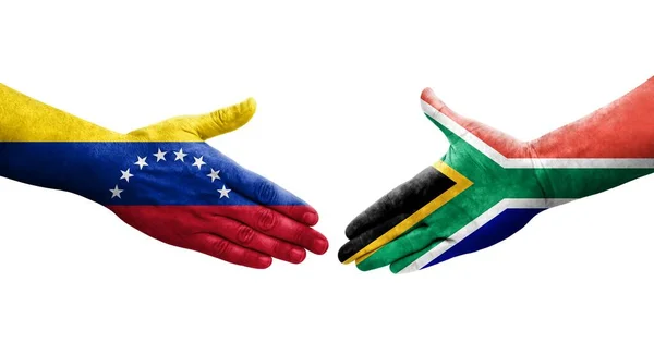 Händedruck Zwischen Südafrikanischen Und Venezolanischen Flaggen Auf Hände Gemalt Isoliertes — Stockfoto