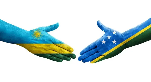 Aperto Mão Entre Ilhas Salomão Bandeiras Ruanda Pintadas Mãos Imagem — Fotografia de Stock