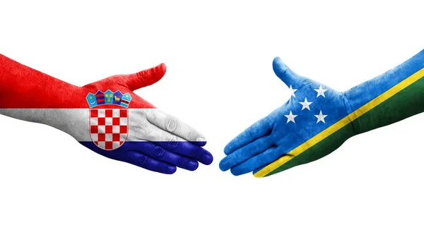 Handslag Mellan Salomonöarna Och Kroatien Flaggor Målade Händer Isolerad Transparent — Stockfoto