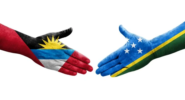 Handshake Entre Ilhas Salomão Antígua Barbuda Bandeiras Pintadas Mãos Imagem — Fotografia de Stock